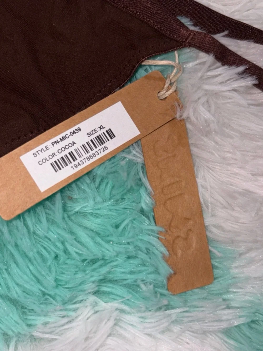 Skims Thong in color cocoa size XL